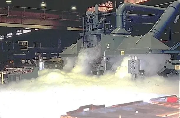 Local application carbon dioxide fire system discharges on a metal rolling mill